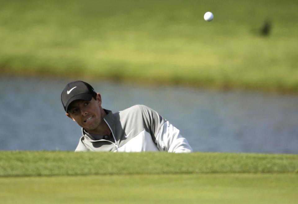 Rory McIlroy, of Northern Ireland, takes a shot on the 18th hole during the second round of the Houston Open golf tournament, Friday, April 4, 2014, in Humble, Texas. (AP Photo/Patric Schneider)