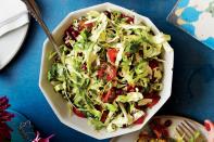 This punchy, slaw-like salads tastes amazing when stuffed inside of <a href="https://www.epicurious.com/expert-advice/how-to-make-pita-at-home-shaya-article?mbid=synd_yahoo_rss" rel="nofollow noopener" target="_blank" data-ylk="slk:fresh pita;elm:context_link;itc:0;sec:content-canvas" class="link ">fresh pita</a>—and it's just as good when it's eaten on its own. <a href="https://www.epicurious.com/recipes/food/views/shredded-cabbage-salad-with-pomegranate-and-tomatoes-56390059?mbid=synd_yahoo_rss" rel="nofollow noopener" target="_blank" data-ylk="slk:See recipe.;elm:context_link;itc:0;sec:content-canvas" class="link ">See recipe.</a>