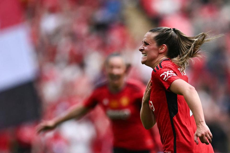 Ella Toone celebrates her opening goal  (AFP/Getty)