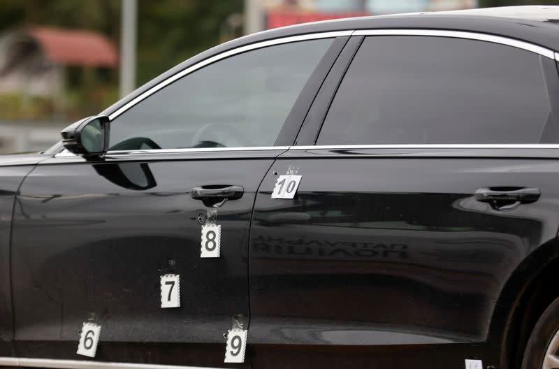 A view shows bullet holes in a car of presidential aide Serhiy Shefir following an assault outside Kyiv