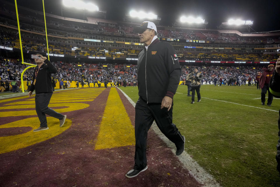 Washington Commanders head coach Ron Rivera walking off the field at an NFL football game against the Dallas Cowboys, Sunday, Jan. 7, 2024, in Landover, Md. Dallas won 38-10. (AP Photo/Mark Schiefelbein)