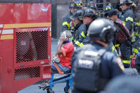 <p>First responders tend to an injured pedestrian after a vehicle struck pedestrians on a sidewalk in Times Square in New York on May 18, 2017. (Lucas Jackson/Reuters) </p>