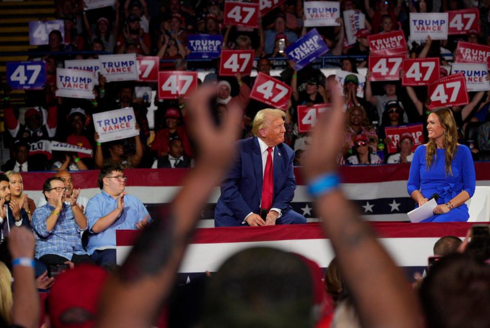 Former president Donald Trump speaks to an audience during a town hall meeting at Dort Financial Center in Flint, Michigan on Tuesday, Sept. 17, 2024.