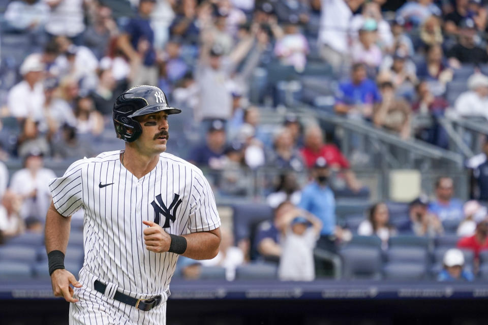 New York Yankees' Matt Carpenter watches the ball as he runs the bases after hitting a two-run home run in the sixth inning of a baseball game against the Chicago Cubs, Sunday, June 12, 2022, in New York. (AP Photo/Mary Altaffer)