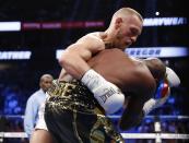 <p>Conor McGregor in action with Floyd Mayweather Jr., Saturday, Aug. 26, 2017, in Las Vegas. REUTERS/Steve Marcus </p>