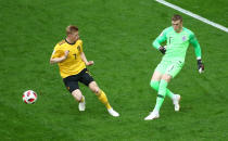 <p>Belgium’s Kevin De Bruyne in action with England’s Jordan Pickford (REUTERS/Michael Dalder) </p>