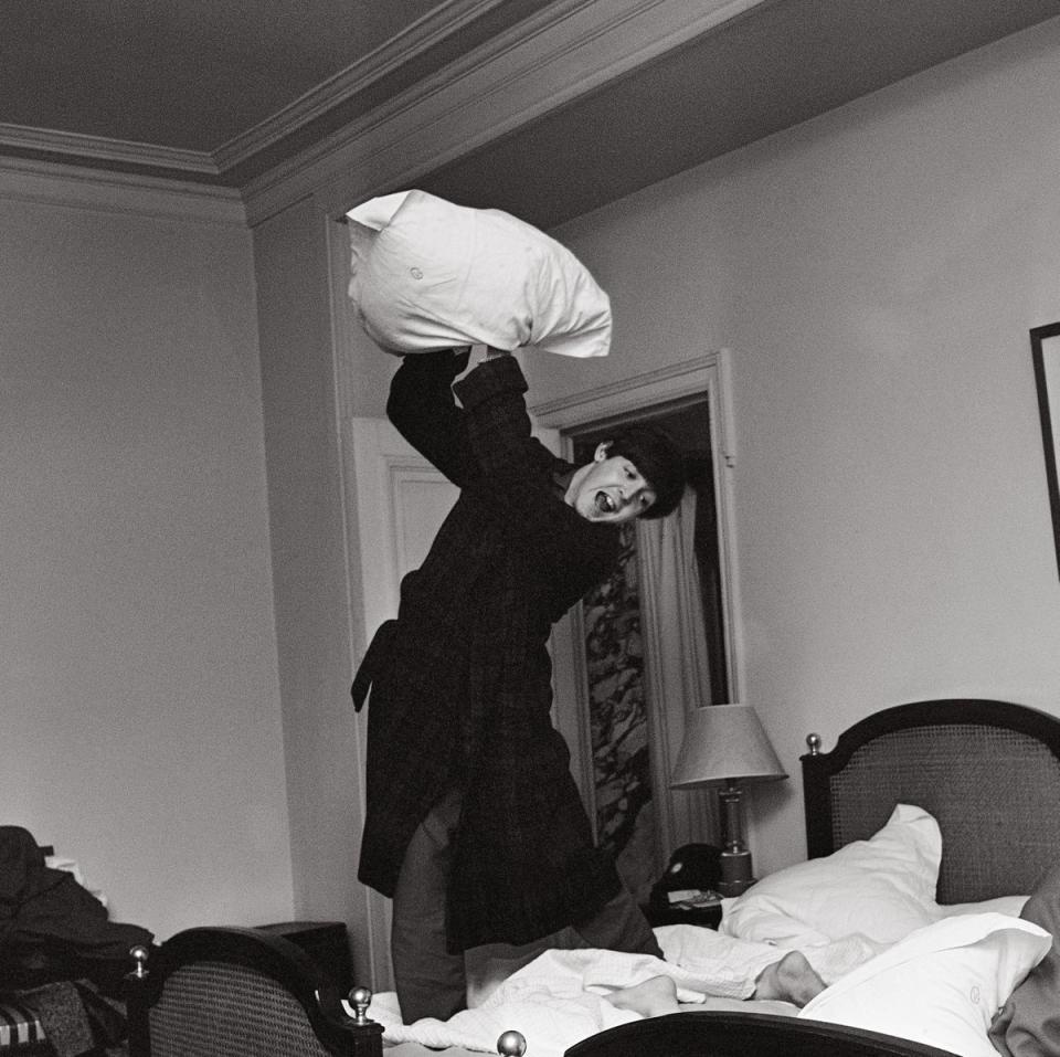 Paul during a pillow fight at the George V Hotel in Paris after a concert at the Olympia. ‘I Want to Hold Your Hand’ had just hit the American charts, 18 January 1964 (Harry Benson)