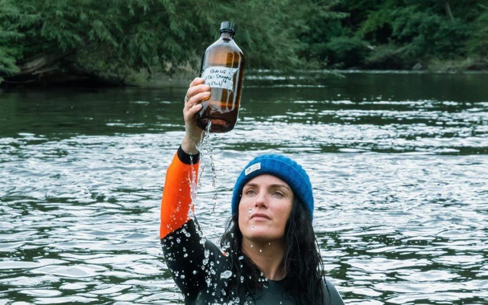 Laura Owen, a wild swimmer who is swimming the lakes in all of the UK's national parks to research microplastics - David Stevens