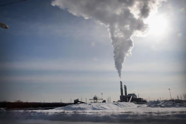 Smoke rises from a coal-fired power plant in February 2019 in Romeoville, Illinois. A recent polar vortex had taxed power systems across the Midwest as demand for electricity climbed as temperatures plunged. (Photo: Scott Olson/Getty Images)