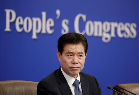 Chinese Commerce Minister Zhong Shan attends a news conference during ongoing session of the NPC in Beijing