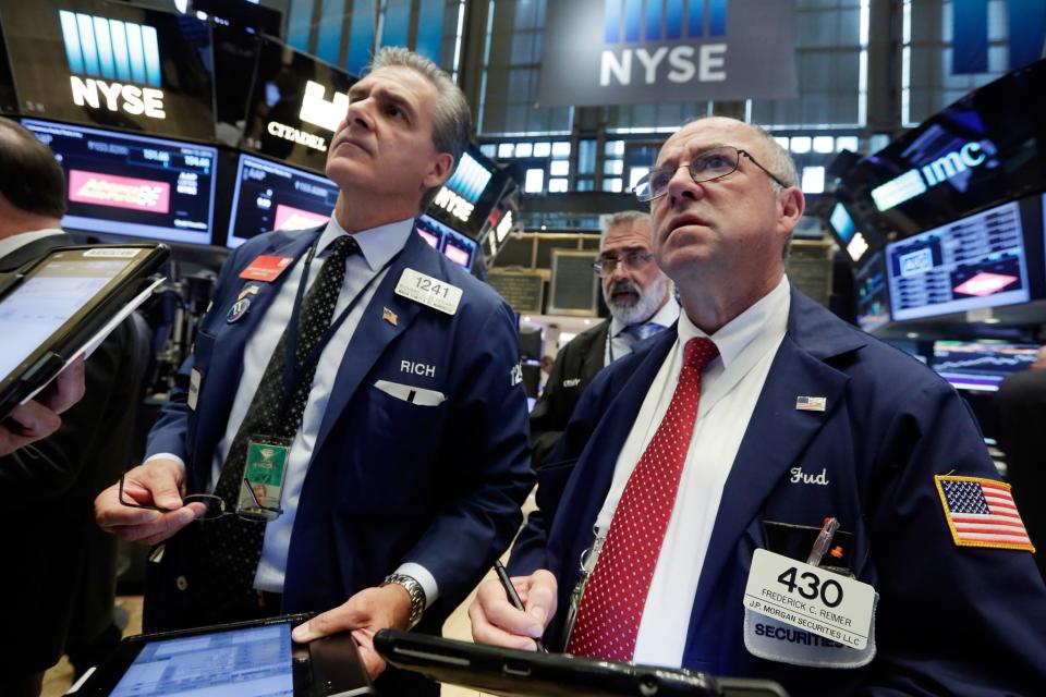 <em>Brokers en la Bolsa de Nueva York. Yahoo Finance Video</em>