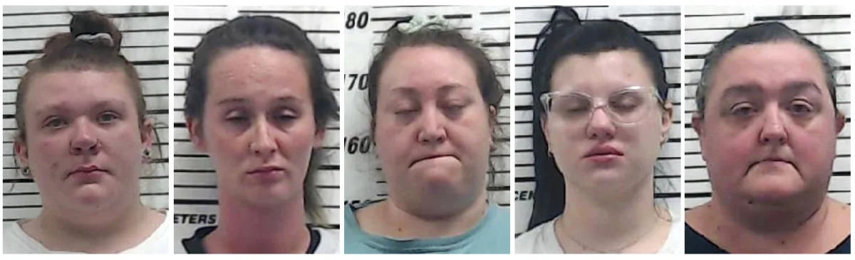 Day care workers charged, accused of scaring tots with mask