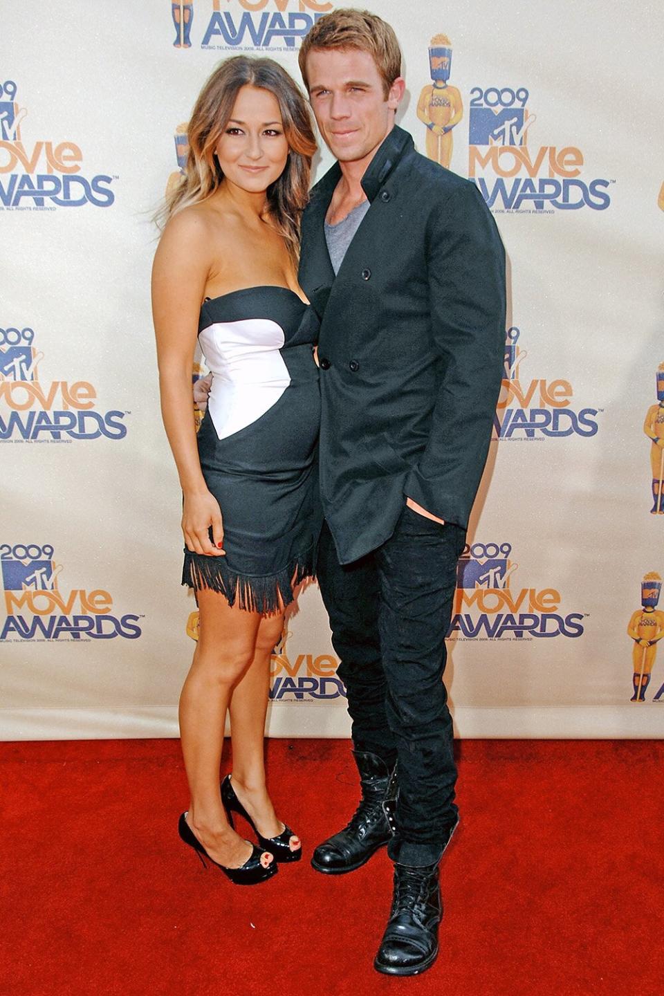 Actor Cam Gigandet (R) and Dominique Geisendorff arrive at the 2009 MTV Movie Awards held at the Gibson Amphitheatre on May 31, 2009 in Universal City, California. (Photo by Steve Granitz/WireImage)