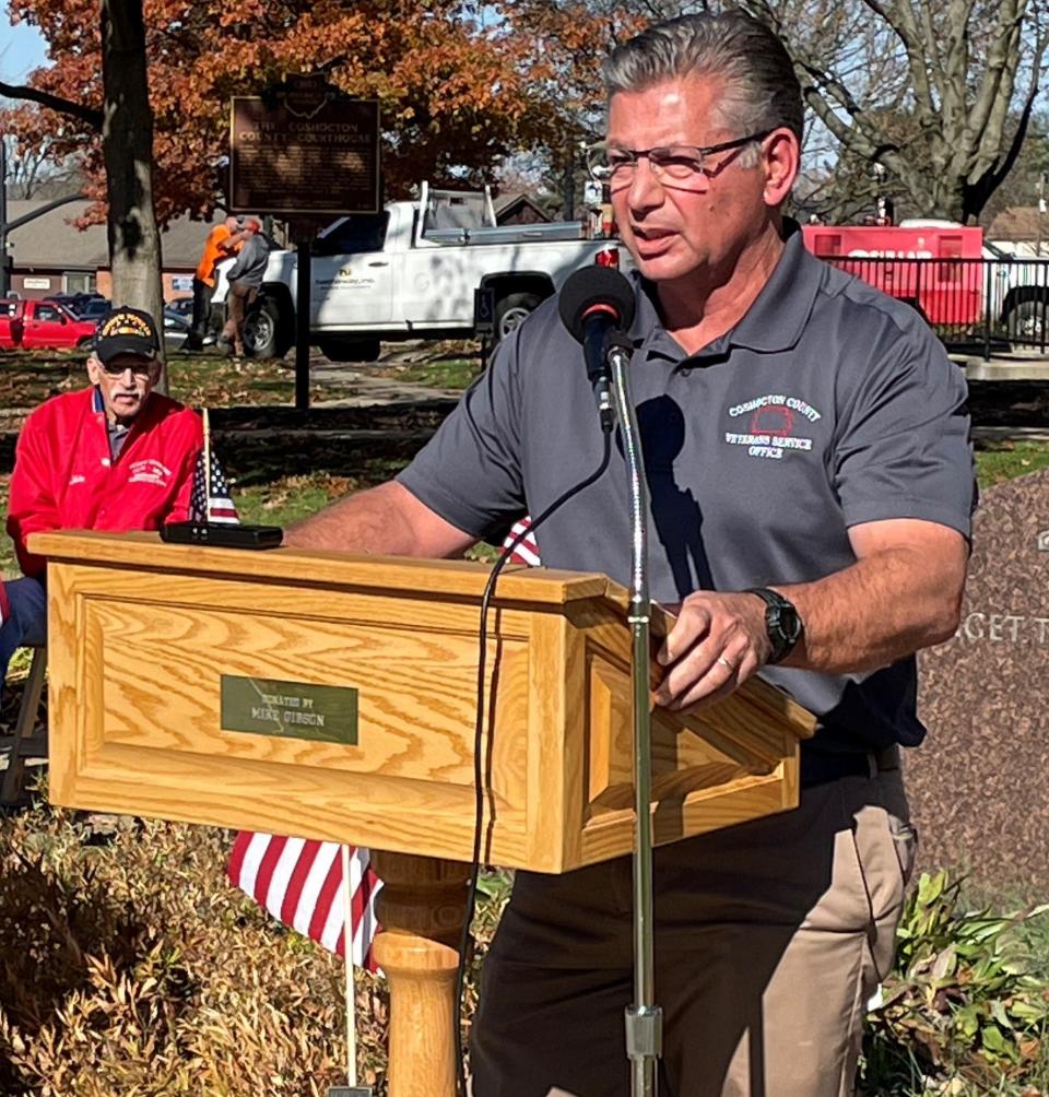 Doug Schaefer, Coshocton County Veterans Service Officer, speaks at the annual Veterans Day ceremony on the Coshocton Court Square. His message encouraged veterans to connect and engage with their communities as they assimilate to civilian life.