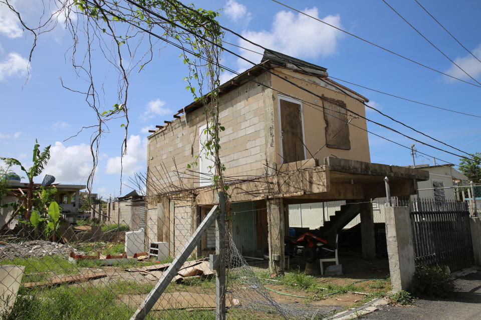 Before the hurricane,&nbsp;Keishla Acevedo lived in her grandmother's home with her husband and son. The house, pictured here shortly after Maria, lost part of its roof and suffered other structural damage during the storm. (Photo: Carolina Moreno/HuffPost)