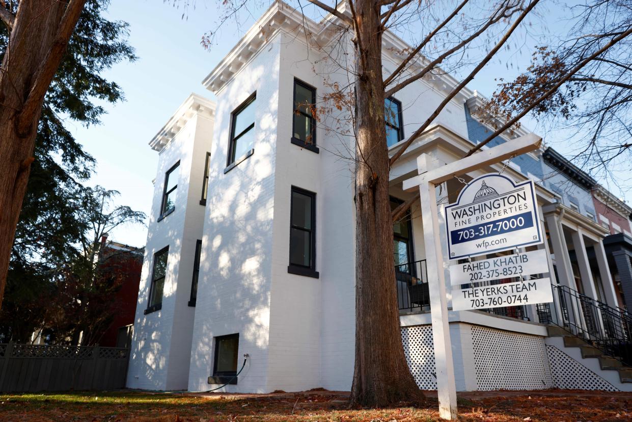 A house on sale is seen in Washington D.C., the United States on Dec. 12, 2021. U.S. annual home price growth remained strong at 18 percent in October, the highest recorded in the 45-year history of the index, according to CoreLogic's Home Price Index. (Photo by Ting Shen/Xinhua via Getty Images)