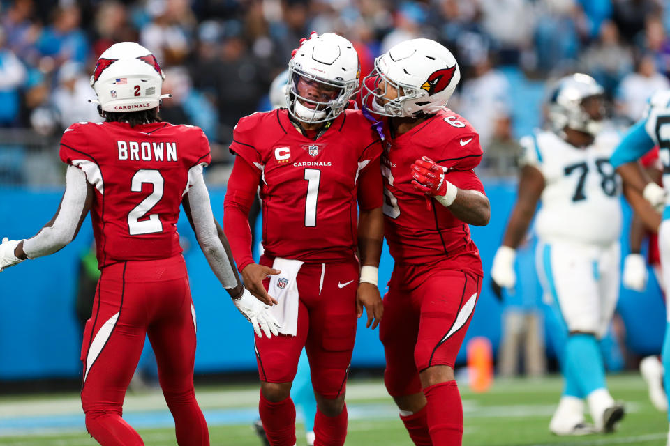 CHARLOTTE, NC - OCTOBER 02: James Conner (6) and Marquise Brown (2) congratulate Kyler Murray (1) of the Arizona Cardinals after he scores a touchdown during a football game between the Carolina Panthers and the Arizona Cardinals on October 2, 2022, at Bank of America Stadium in Charlotte, NC. (Photo by David Jensen/Icon Sportswire via Getty Images)