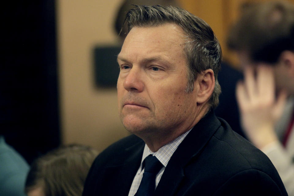 Kansas Attorney General Kris Kobach follows a Kansas Senate committee hearing on a proposal to prevent the state from investing funds using ESG principles, Tuesday, March 7, 2023, at the Statehouse in Topeka, Kan. ESG stands for environmental, social and governance, and conservative Republicans like Kobach are trying to block it across the U.S. (AP Photo/John Hanna)