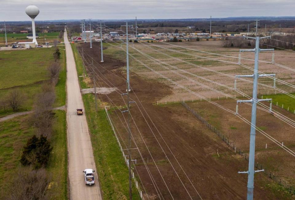New power poles set to feed electricity to the $4 billion Panasonic electric vehicle battery plant in De Soto line 95th Street. Tammy Ljungblad/tljungblad@kcstar.com