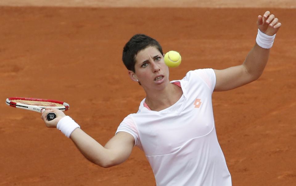 Carla Suarez Navarro of Spain prepares to hit a return to Taylor Townsend of the U.S during their women's singles match at the French Open tennis tournament at the Roland Garros stadium in Paris