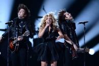 <p>At the 2013 awards, The Band Perry <a href="https://www.youtube.com/watch?v=ans9pJ1MQuI" rel="nofollow noopener" target="_blank" data-ylk="slk:performed a lively rendition;elm:context_link;itc:0;sec:content-canvas" class="link ">performed a lively rendition</a> of their hit track "Done." Although the visuals were impressive, complete with aggressive head-banging, surprise pyrotechnics, and synchronized dance moves, all the excitement left lead singer Kimberly Perry out of breath by the end of the song. At least they were enthusiastic! </p>