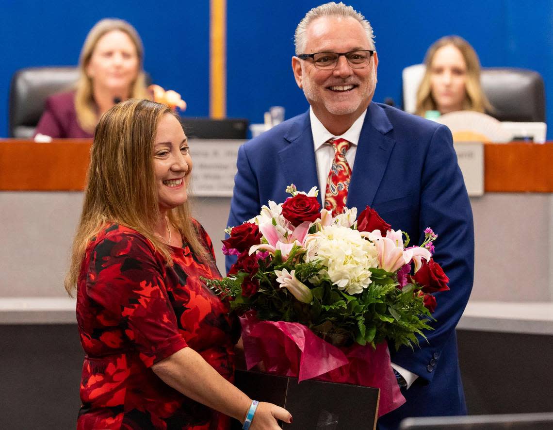 Broward County School Board Chair Lori Alhadeff is presented with flowers after being re-elected to her position during a school board meeting at the Kathleen C. Wright Building on Tuesday, Nov. 14, 2023, in Fort Lauderdale, Fla.