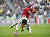 Football Soccer - Juventus v Carpi - Italian Serie A - Juventus stadium, Turin, Italy - 01/05/16 Juventus' Juan Cuadrado in action against Carpi's Raphael Alves De Lima Martinho. REUTERS/Giorgio Perottino