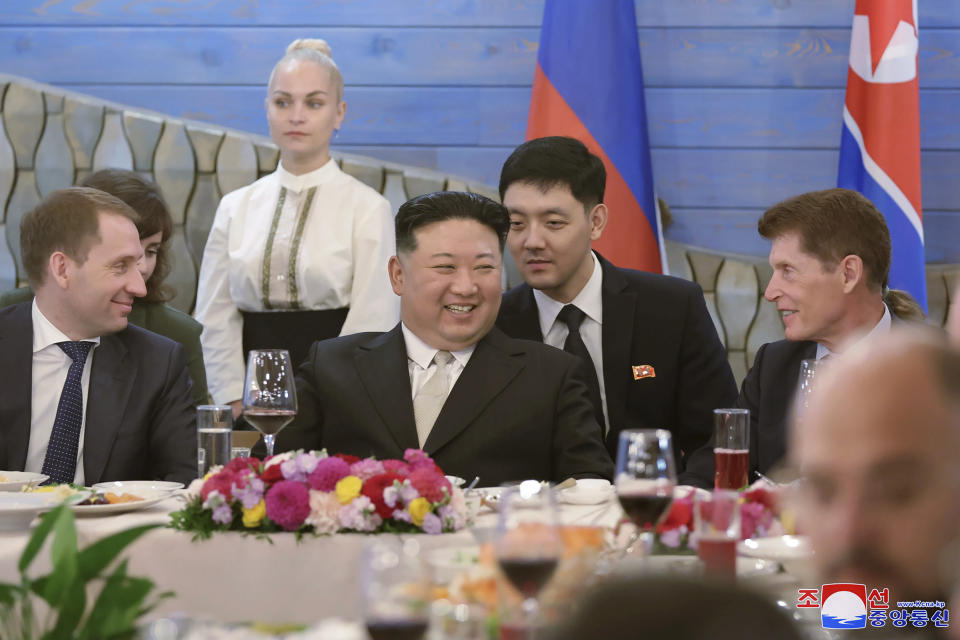 In this photo provided by the North Korean government, North Korea leader Kim Jong Un, center, shares a moment with Governor of the Russian far eastern region of Primorsky Krai Oleg Kozhemyako, right, and Russian Minister of Natural Resources and Ecology Alexander Kozlov, left, during a banquet in Vladivostok, Russian Far East Sunday, Sept. 17, 2023. Independent journalists were not given access to cover the event depicted in this image distributed by the North Korean government. The content of this image is as provided and cannot be independently verified. Korean language watermark on image as provided by source reads: "KCNA" which is the abbreviation for Korean Central News Agency. (Korean Central News Agency/Korea News Service via AP)