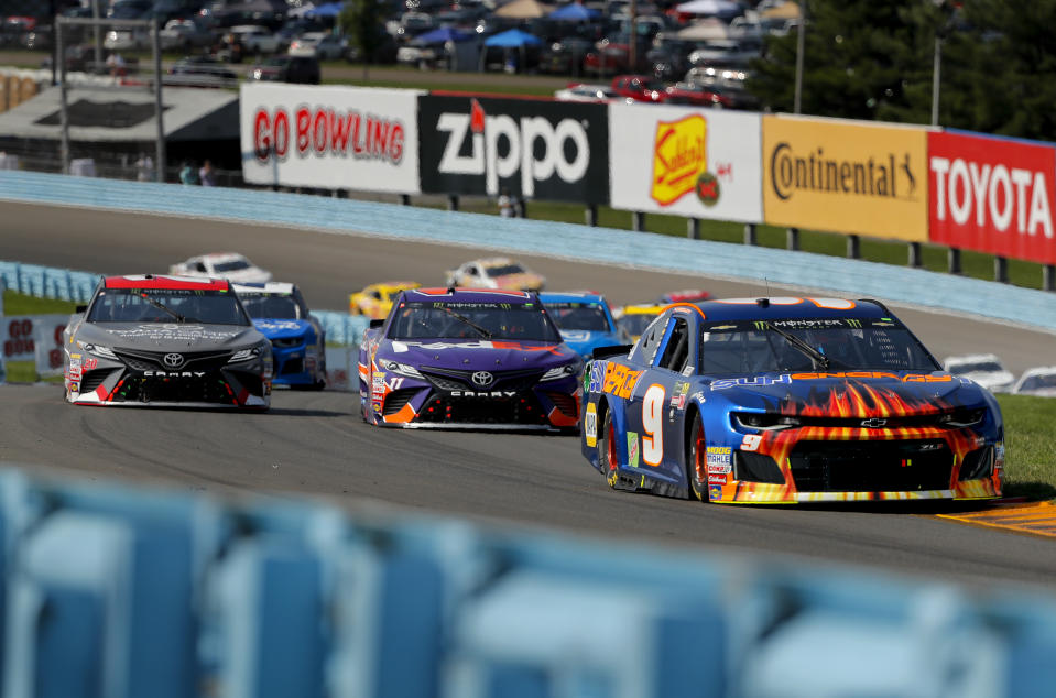 Chase Elliott (9) leads the pack through the esses during a NASCAR Cup Series auto race, Sunday, Aug. 5, 2018, in Watkins Glen, N.Y. (AP Photo/Julie Jacobson)