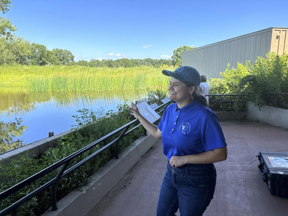 University of Wisconsin-Madison senior Arianna Barajas talks about whooping cranes on Tuesday, Aug. 15, 2023, near Baraboo, Wis. Barajas, who identifies as Mexican-American, is spending the summer working for the International Crane Foundation as part of the Natural Resources Foundation of Wisconsin's Diversity in Conservation Internships. (AP Photo/Todd Richmond)