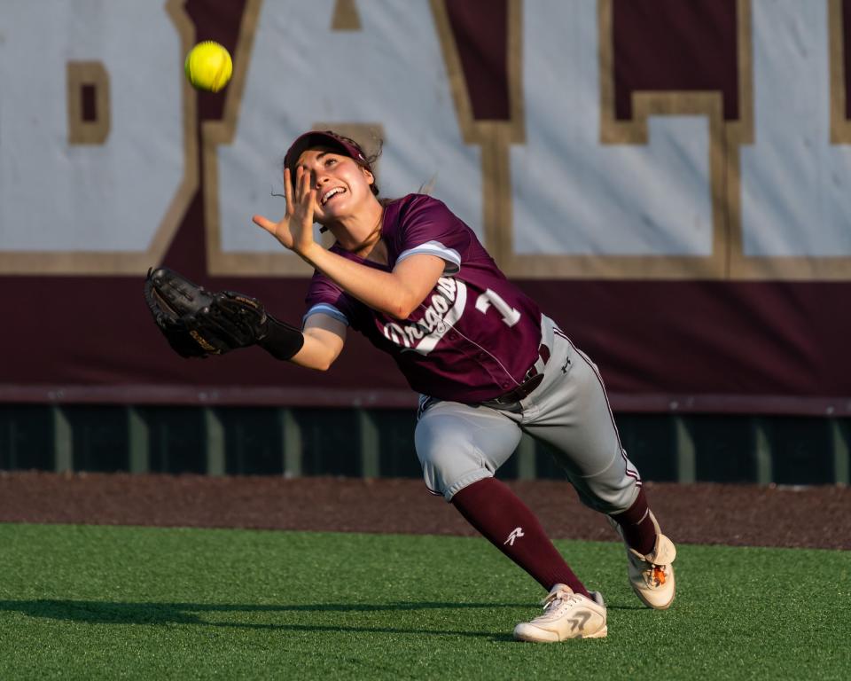 Round Rock senior outfielder Maddie Woodul, making a catch against San Antonio O'Connor, recently was accepted at Texas. This summer she will go on a mission with her church and work at a refugee camp in Romania. Most people don't know that she sews her own clothes.