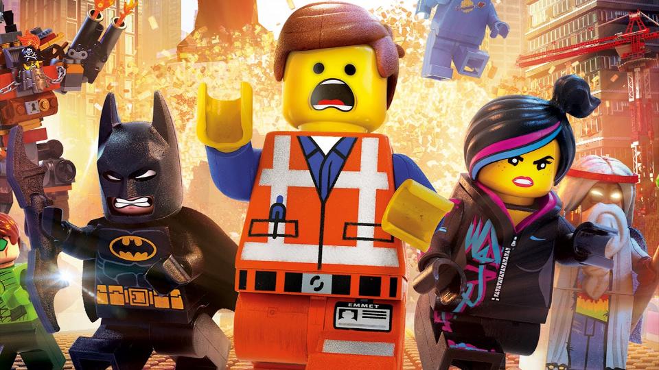 A promotional image for 2014's The Lego movie, starring Emmett, Batman, and Wyldstyle