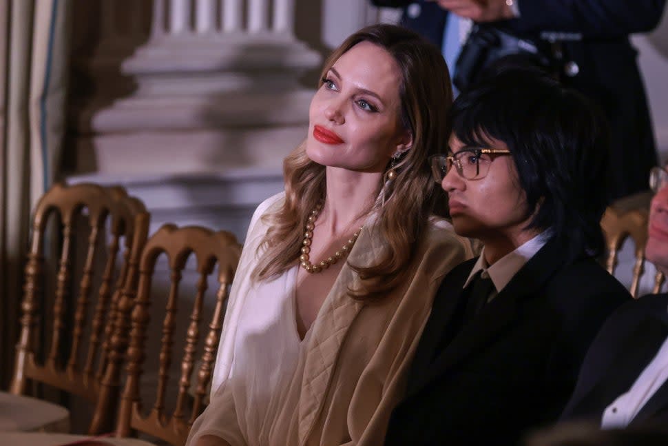 Actress Angelina Jolie, left, and Maddox Jolie-Pitt during a state dinner in honor of South Korean President Yoon Suk Yeol and South Korean First Lady Kim Keon Hee hosted by US President Joe Biden and First Lady Jill Biden at the White House in Washington, DC, US, on Wednesday, April 26, 2023.