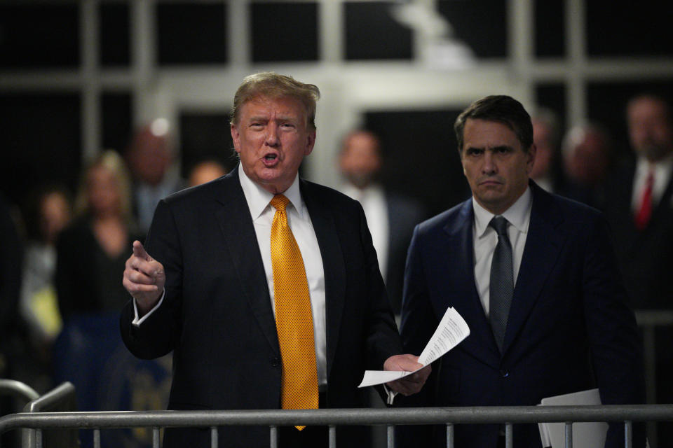 NEW YORK, NEW YORK - MAY 21: Former U.S. President Donald Trump with attorney Todd Blanche speaks to the media during his trial for allegedly covering up hush money payments at Manhattan Criminal Court on May 21, 2024 in New York City. Trump was charged with 34 counts of falsifying business records last year, which prosecutors say was an effort to hide a potential sex scandal, both before and after the 2016 presidential election. Trump is the first former U.S. president to face trial on criminal charges. (Photo by Curtis Means-Pool/Getty Images)