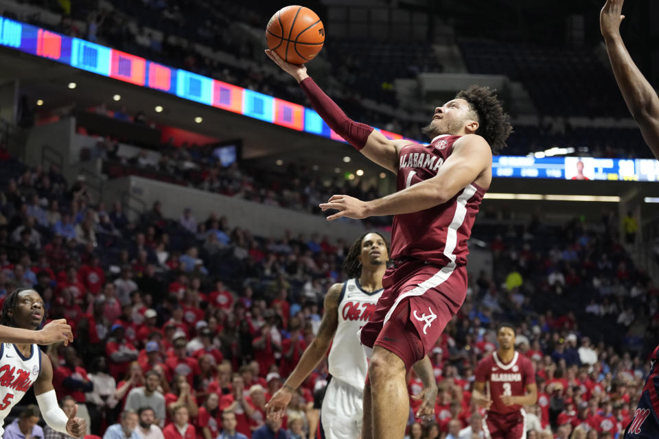 Alabama guard Mark Sears (1) attempts a layup against Mississippi during the first half of an NCAA college basketball game, Wednesday, Feb. 28, 2024, in Oxford, Miss. (AP Photo/Rogelio V. Solis)