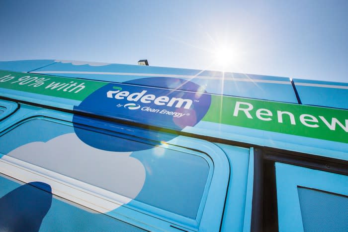Side of transit bus with Clean Energy's Redeem logo.