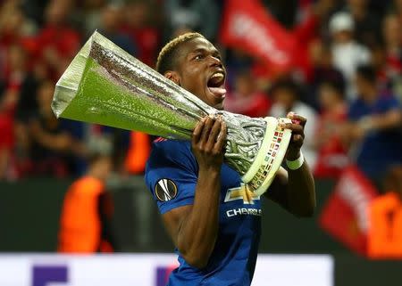 Football Soccer - Ajax Amsterdam v Manchester United - UEFA Europa League Final - Friends Arena, Solna, Stockholm, Sweden - 24/5/17 Manchester United's Paul Pogba celebrates with the trophy after winning the Europa League Reuters / Michael Dalder Livepic