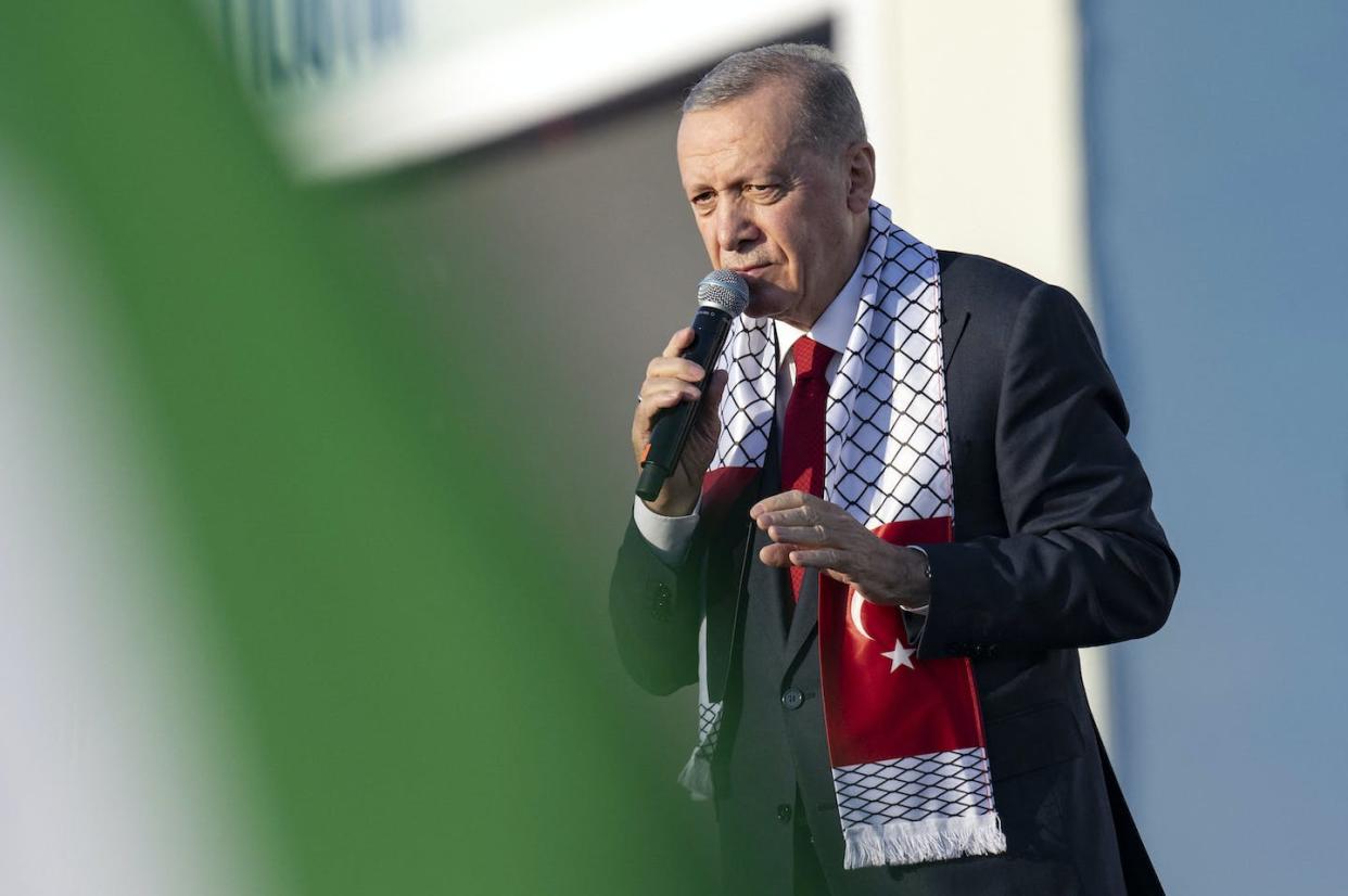 Turkish President Recep Tayyip Erdogan addresses a pro-Palestinian crowd in Istanbul. <a href="https://www.gettyimages.com/detail/news-photo/turkish-president-tayyip-erdogan-speaks-during-a-rally-news-photo/1749720071?adppopup=true" rel="nofollow noopener" target="_blank" data-ylk="slk:Yasin Akgul/AFP via Getty Images);elm:context_link;itc:0;sec:content-canvas" class="link ">Yasin Akgul/AFP via Getty Images)</a>