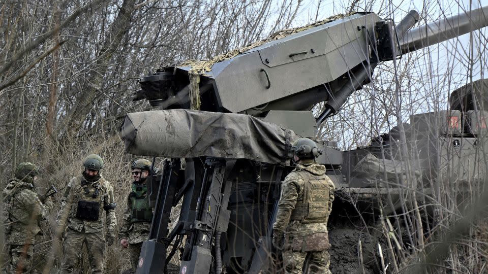 Ukrainian servicemen of the Air Assault Forces prepare to fire a 155mm Caesar 8x8 wheeled self-propelled howitzer on a front line in an undisclosed location, southern Ukraine, on February 14, 2024. - Genya Savilov/AFP/Getty Images