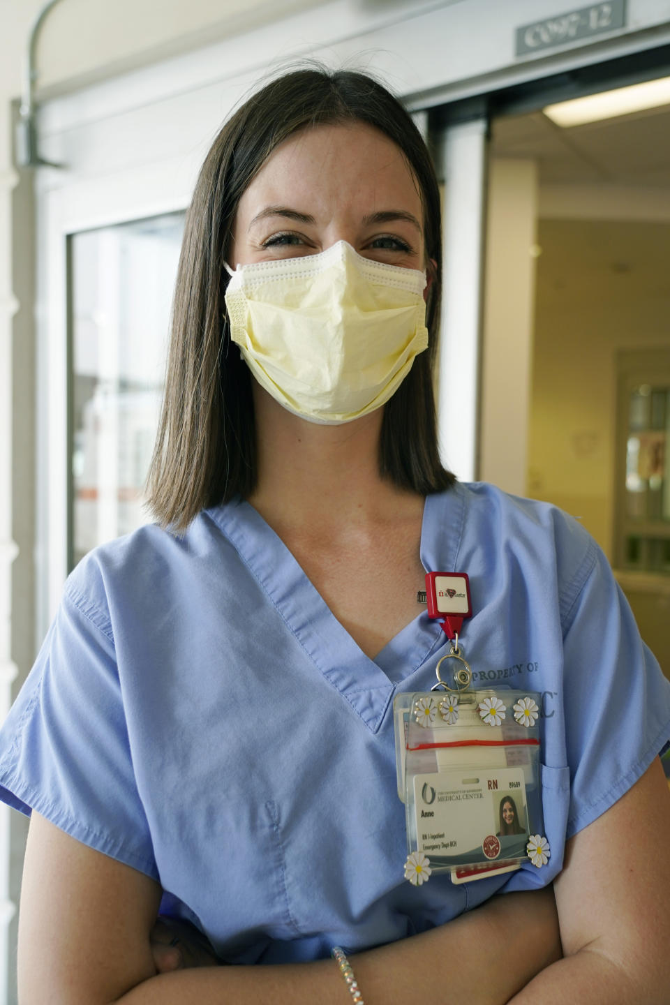 Anne Sinclair, a pediatric emergency room nurse at the University of Mississippi Medical Center, in Jackson, wonders why some incoming patients and their parents have to be reminded to wear masks when they come to the hospital, Wednesday, Aug. 25, 2021. A mother of two young children, Sinclair is tired of the covid misinformation she deals with having seen children in her unit die of the virus. (AP Photo/Rogelio V. Solis)
