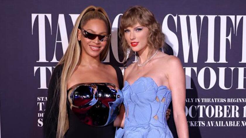 Beyonce poses with Taylor Swift at the "Eras" film premiere in Los Angeles