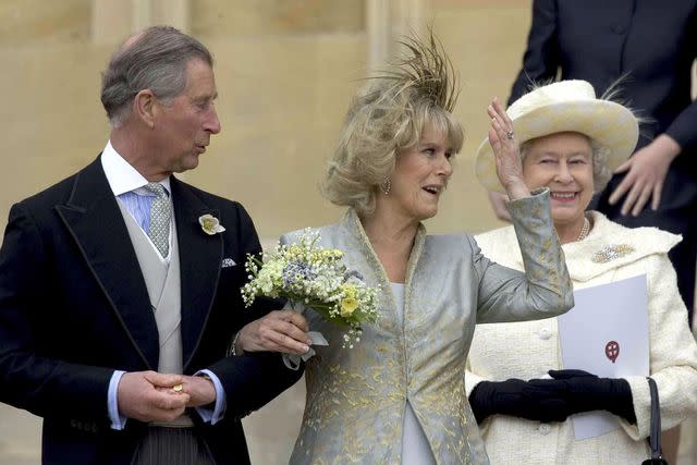 <p> Bob Collier - PA Images/PA Images via Getty</p> Prince Charles, Camilla, Duchess of Cornwall and Queen Elizabeth leave St. George's Chapel at Windsor on April 9, 2005.