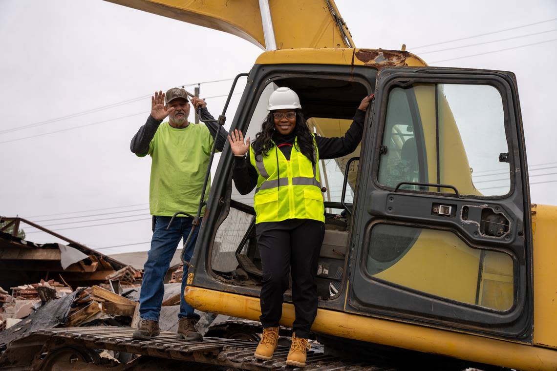 Warner Robins Mayor LaRhonda Patrick stands on a bulldozer at a demolition earlier this year. The city will hold is thrid demolition phase on May 14. Courtesy City of Warner Robins