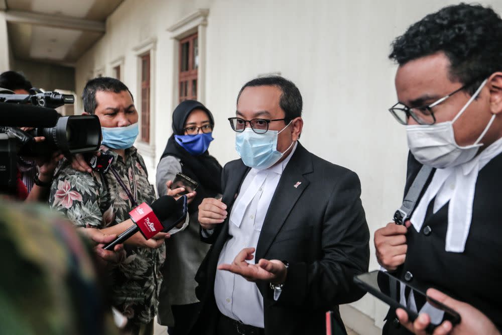 Lawyer Budiman Lutfi Mohamed addresses reporters at the Kuala Lumpur High Court July 14, 2020. — Picture by Firdaus Latif