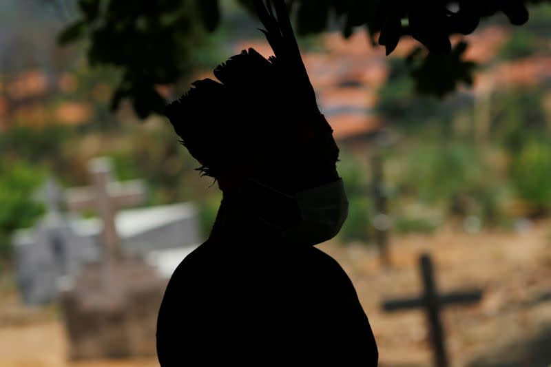 A man from the Guajajara indigenous ethnic group stands at a community school in the indigenous village of Morro Branco