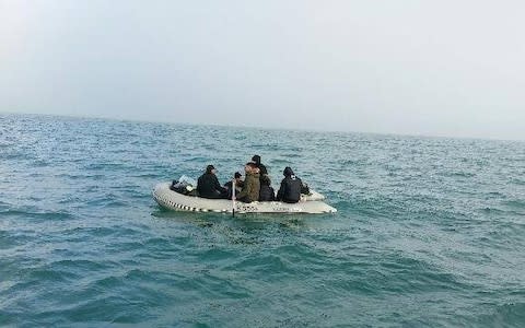 six migrants in a boat - Credit: Premar Manche