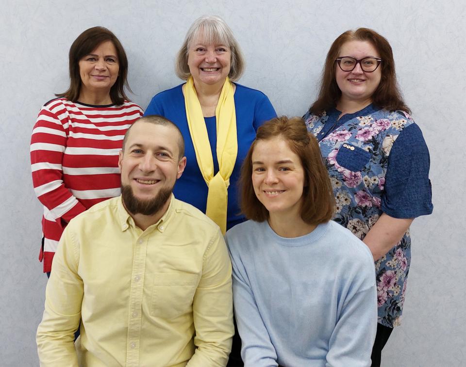 Jacksonville-based missionary Kathy Gould (back row center) runs a child services nonprofit in Ukraine. Here Gould poses with her team in Kyiv: at rear, flanking Gould, are Valentina and Galena; at the front are (from left) Vova and Tanya.