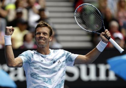 Tomas Berdych of the Czech Republic celebrates after defeating Rafael Nadal of Spain in their quarterfinal match at the Australian Open tennis championship in Melbourne, Australia, Tuesday, Jan. 27, 2015. (AP Photo/Bernat Armangue)