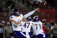 East Carolina quarterback Holton Ahlers throws a pass during the first half of the team's NCAA college football game against Cincinnati, Friday, Nov. 13, 2020, in Cincinnati. (AP Photo/Aaron Doster)