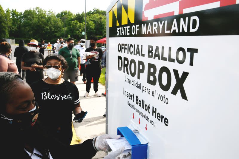 FILE PHOTO: FILE PHOTO: Voters go to the polls to vote in U.S. presidential primary election in College Park, Maryland